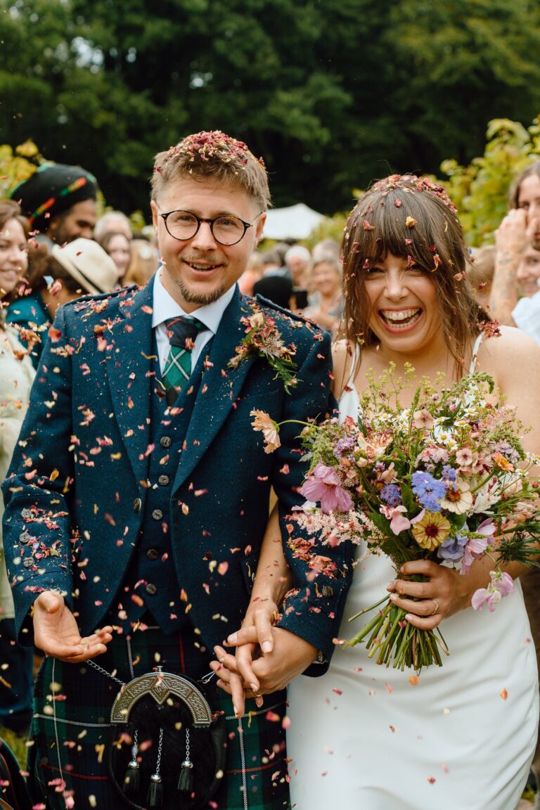 bride and groom confetti walk at Winklestone vineyard