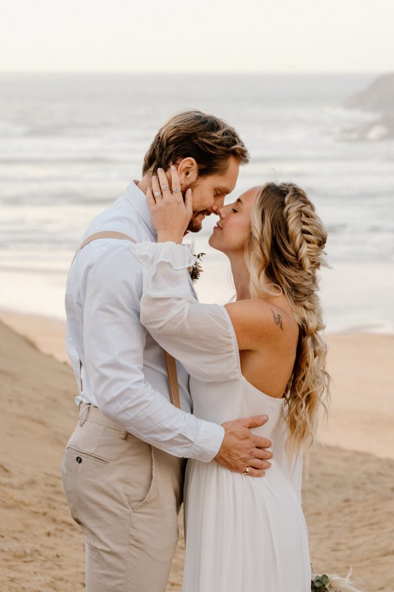 Couple eloping on the beach in Cornwall