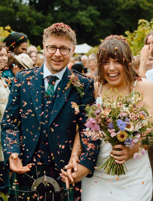 bride and groom confetti walk at Winklestone vineyard