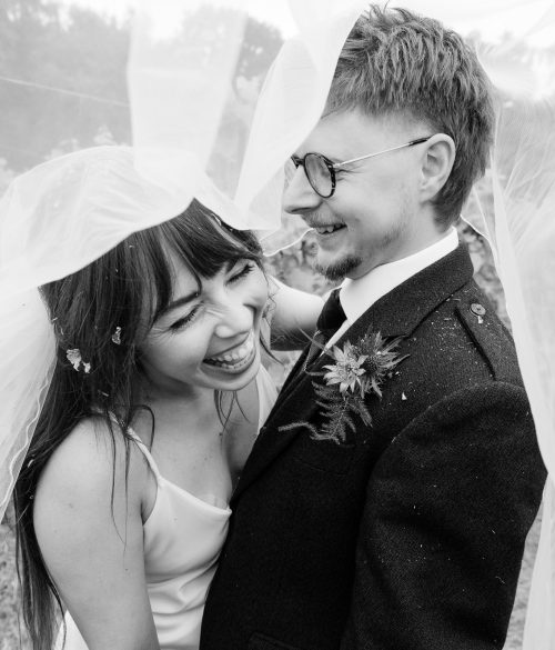 Couple under the veil portrait