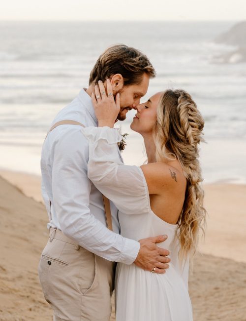 Couple eloping on the beach in Cornwall