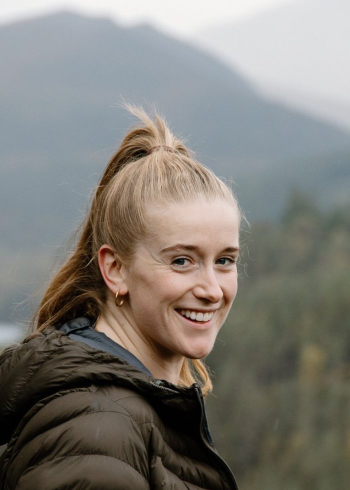 Fran standing at top of glen Affric in Scotland